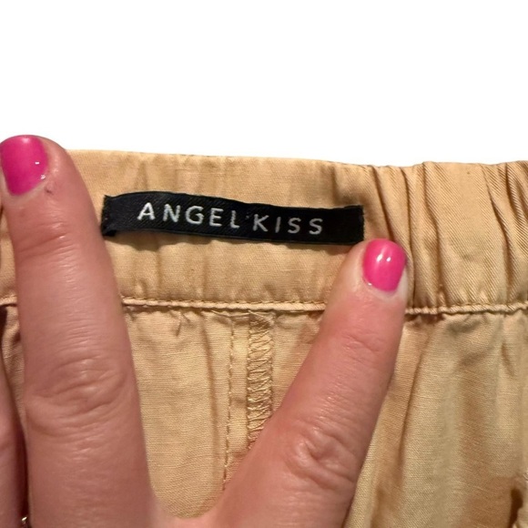 Beige utility-style skort with built-in shorts and a faux wrap front. - Picture 4 of 8